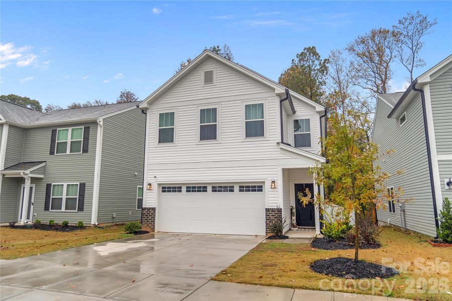 Front exterior of a new home in Aubreywood, Charlotte, NC, highlighting curb appeal (Image 22).