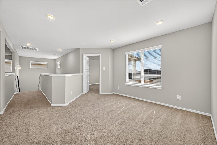 Spacious, unfurnished interior of a new home in Sunterra, Katy (Image 22).