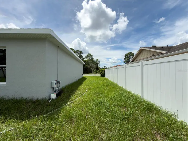 Exterior details and patio area of a home in , Deltona (Image 16).