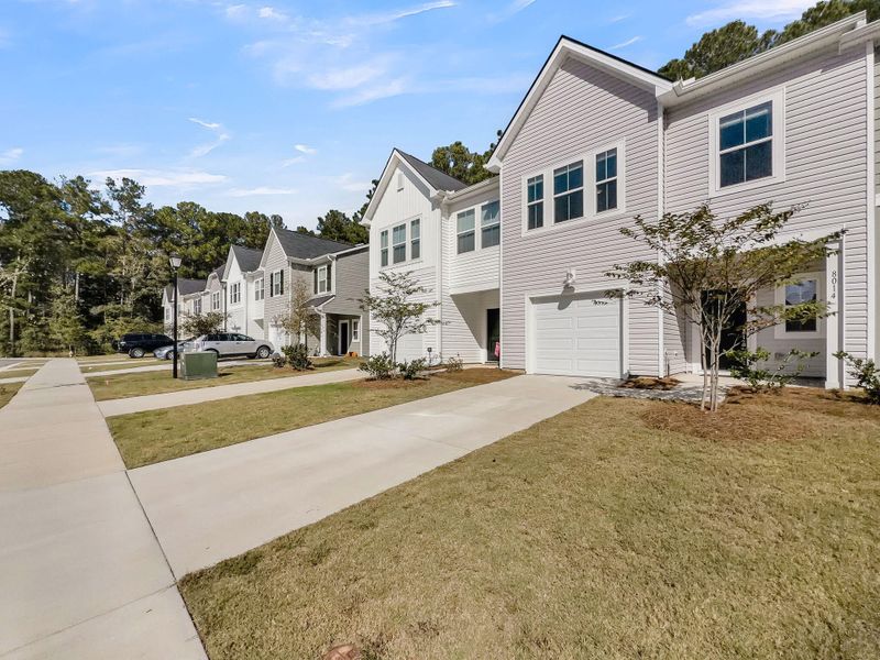 Exterior details and patio area of a home in Willow Bend Townhomes, North Charleston (Image 1). Exterior details and patio area of a home in Willow Bend Townhomes, North Charleston (Image 1).