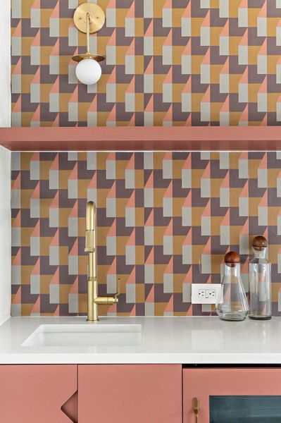 Details featuring wine cooler and a sink