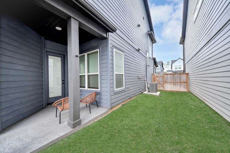 Exterior details and patio area of a home in The Groves 35', Humble (Image 32). Exterior details and patio area of a home in The Groves 35', Humble (Image 32).