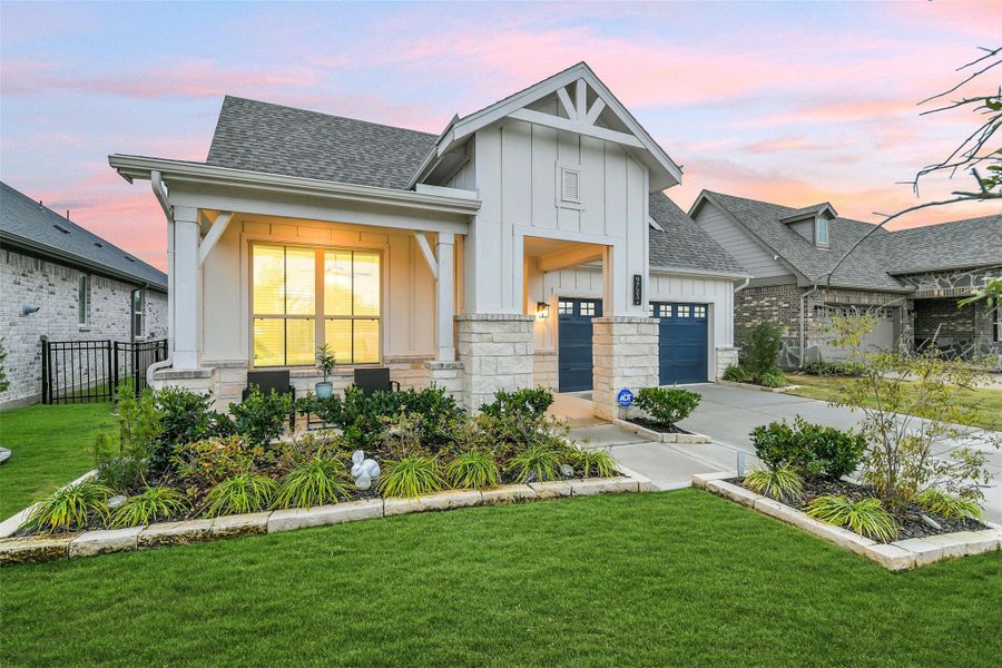 Front exterior of a new home in Del Webb in Chambers Creek, Willis, TX, highlighting curb appeal (Image 20). Front exterior of a new home in Del Webb in Chambers Creek, Willis, TX, highlighting curb appeal (Image 20).