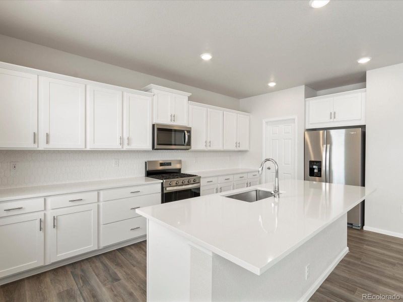 Furnished interior view inside a new home in Poudre Heights: The Alpine Collection, Windsor (Image 8).