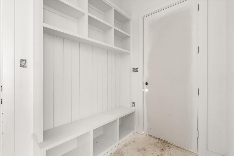 Entry mudroom for storing shoes, bags, and jackets.
