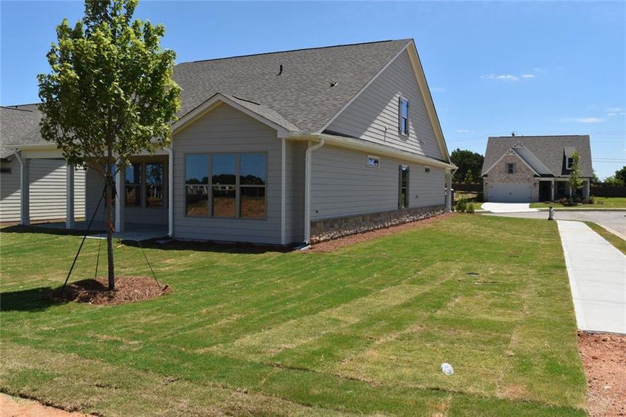 Exterior details and patio area of a home in Soleil Summit Chase, Snellville (Image 22).