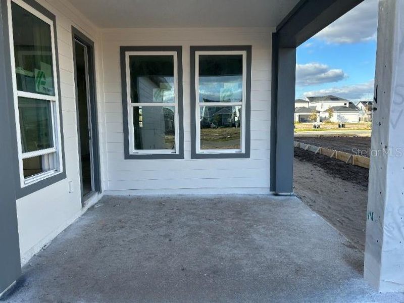 Exterior details and patio area of a home in Weslyn Park Single Family, St. Cloud (Image 5).