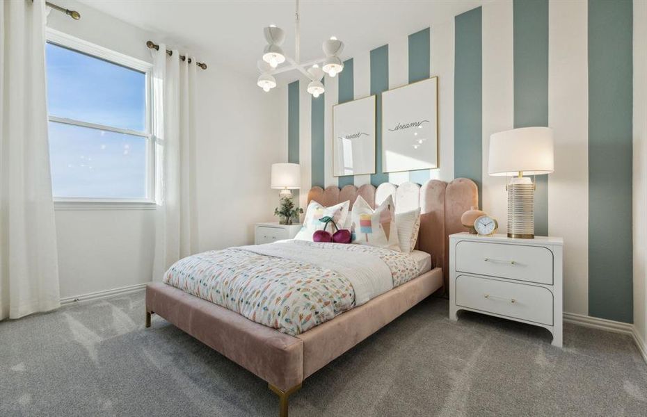 Secondary bedroom designed with generous storage solutions *Model representation