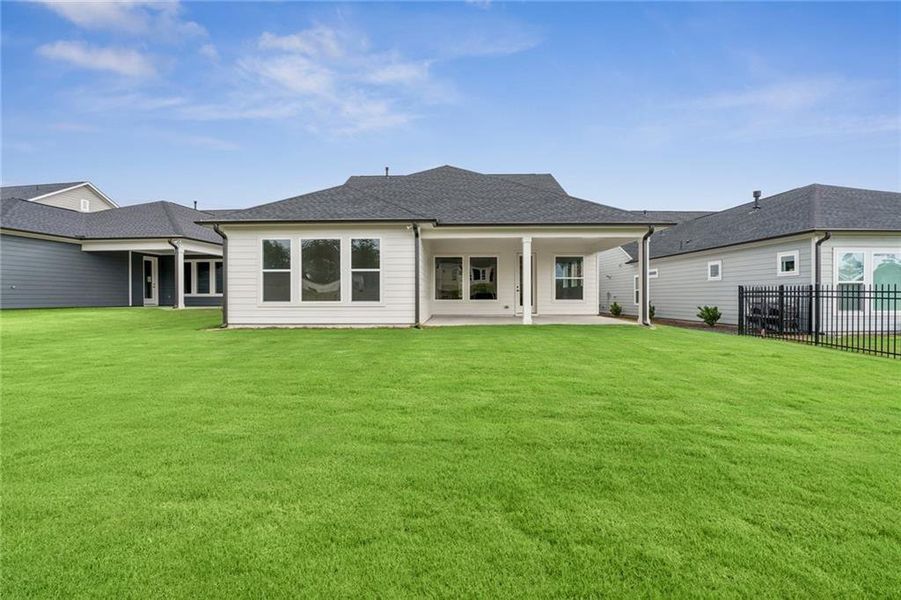 Front exterior of a new home in Crescent Pointe at Great Sky, Canton, GA, highlighting curb appeal (Image 17). Front exterior of a new home in Crescent Pointe at Great Sky, Canton, GA, highlighting curb appeal (Image 17).