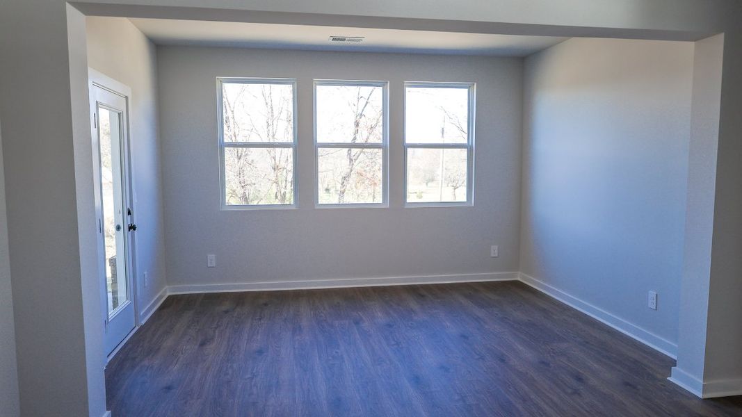 Representative unfurnished interior of a home built from the TISDALE by D.R. Horton in Harvest Point, Spring Hill (Image 28).