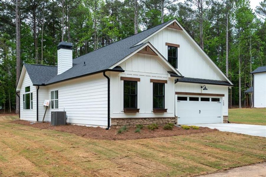 Front exterior of a new home in , Dallas, GA, highlighting curb appeal (Image 19).