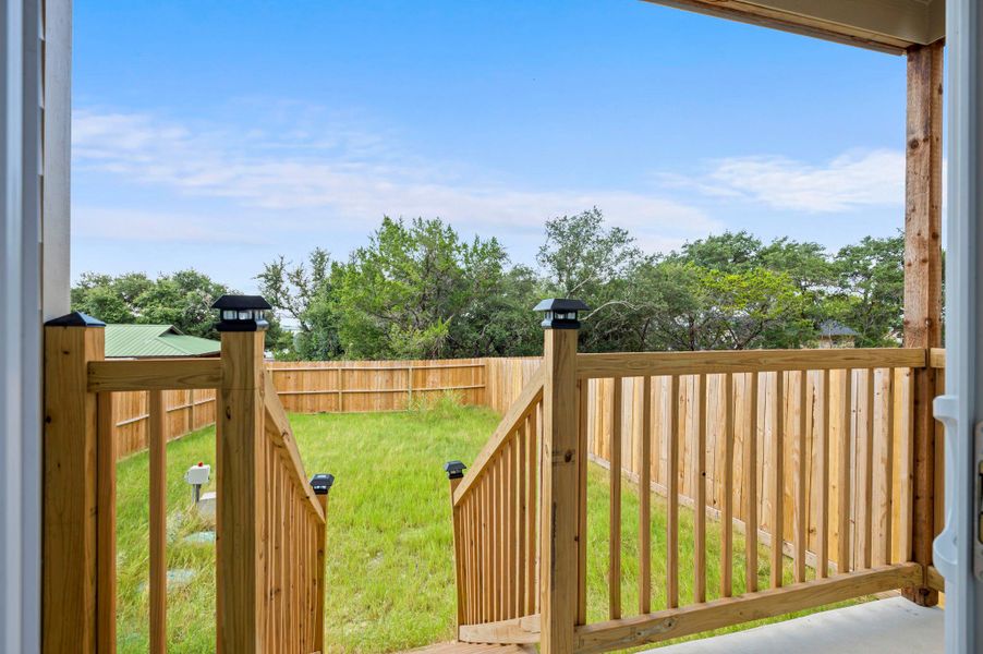 Gate with a fenced backyard