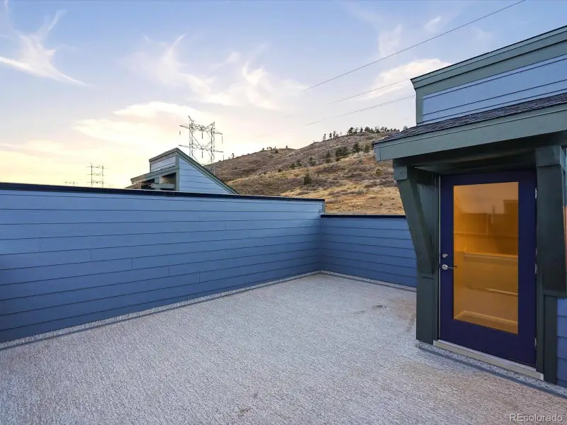 Exterior details and patio area of a home in Three Hills, Morrison (Image 3).