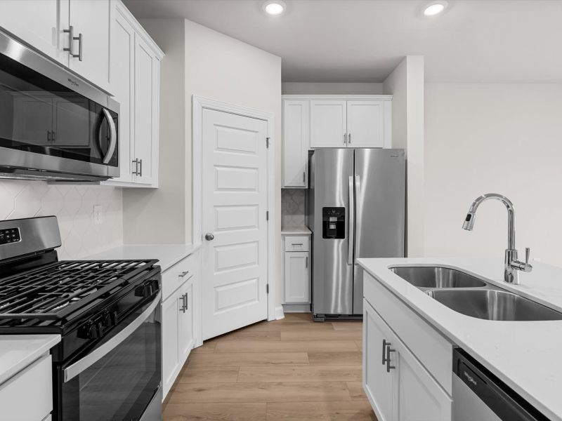 Furnished interior view inside a new home in Crossing at Abner Creek Townes, Greer (Image 6). Furnished interior view inside a new home in Crossing at Abner Creek Townes, Greer (Image 6).
