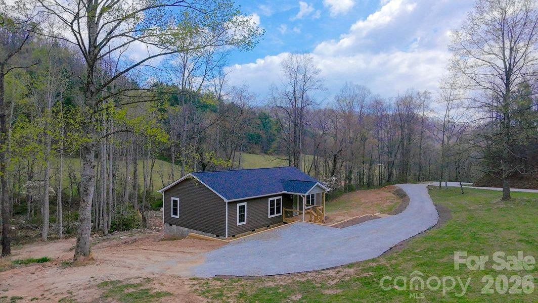 Exterior details and patio area of a home in , Hendersonville (Image 13).