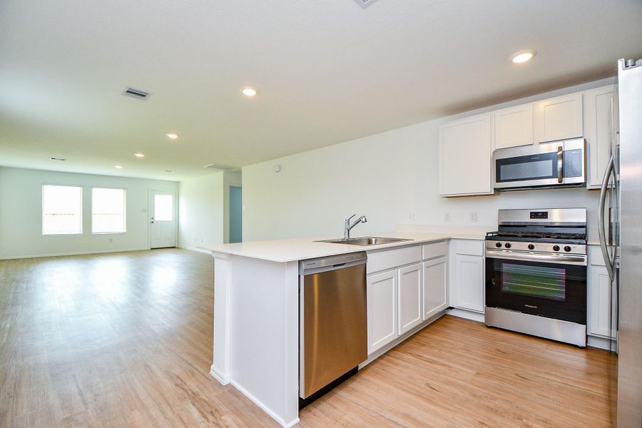 Furnished interior view inside a new home in Tavola: Cottage Collection, New Caney (Image 12).