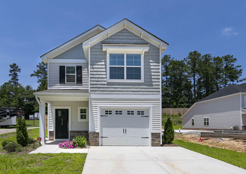 Front exterior of a new home in , Goose Creek, SC, highlighting curb appeal (Image 2).
