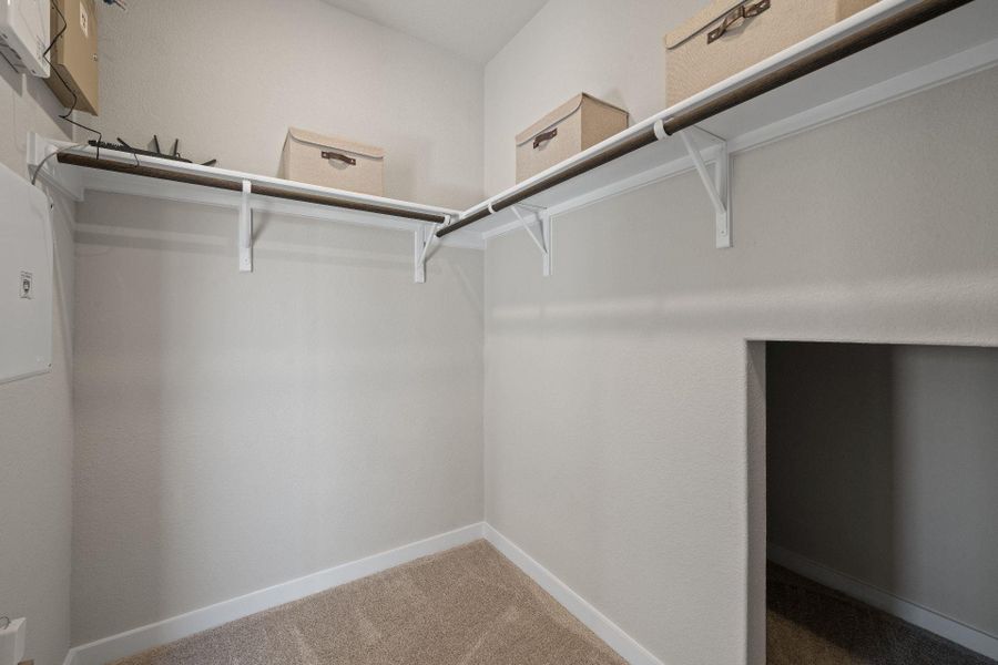 Walk-in closet in Primary Bedroom - Representative Photo