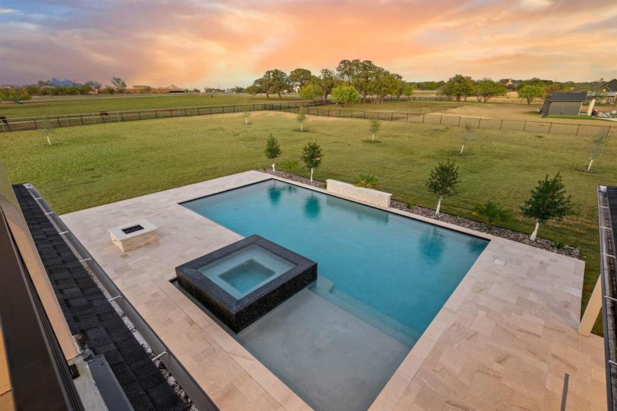 Resort-style pool and spa overlooking the acreage. Resort-style pool and spa overlooking the acreage.