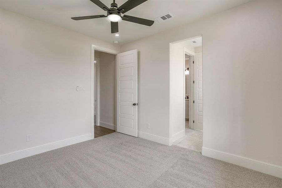 BEDROOM 4 with adjoining Jack and Jill bathroom.