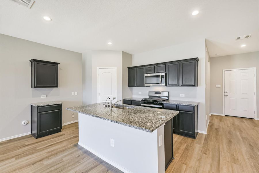 Furnished interior view inside a new home in Harrington Trails at The Canopies, New Caney (Image 6).