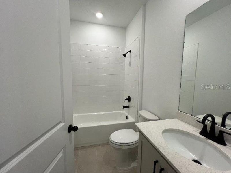 Furnished interior view inside a new home in , Kissimmee (Image 9).