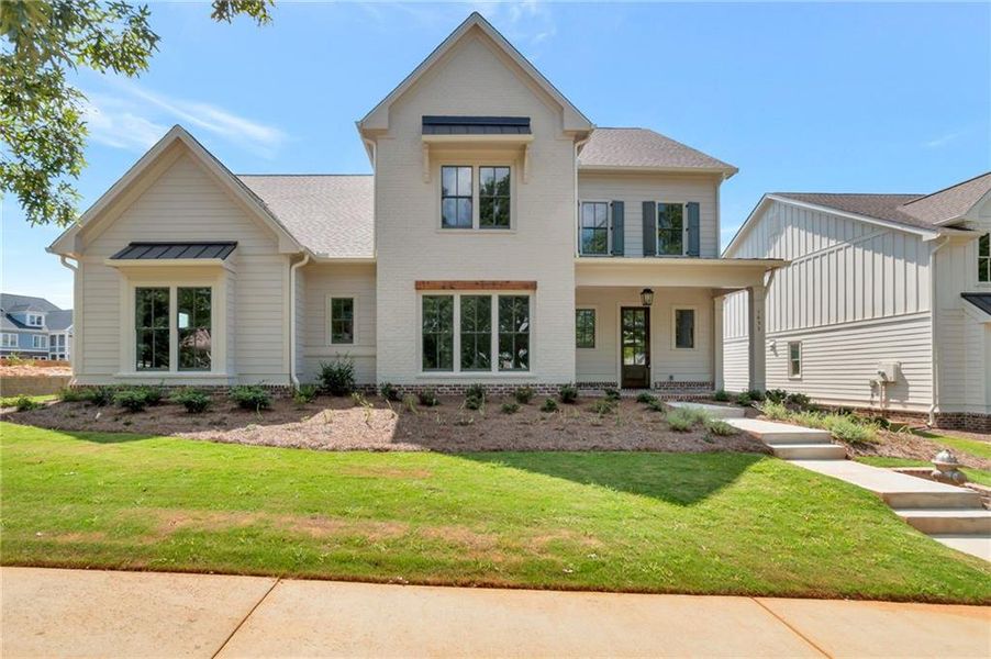 Front exterior of a new home in , Statham, GA, highlighting curb appeal (Image 26).