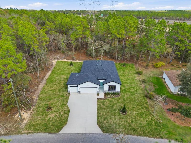 Front exterior of a new home in , Homosassa, FL, highlighting curb appeal (Image 19).