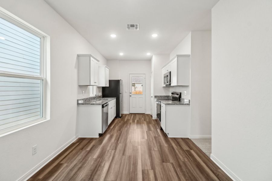 Representative unfurnished interior of a home built from the Comet by Starlight Homes in Trails at Culebra, San Antonio (Image 14). Representative unfurnished interior of a home built from the Comet by Starlight Homes in Trails at Culebra, San Antonio (Image 14).
