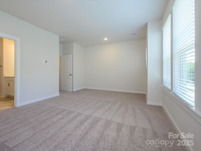 Spacious, unfurnished interior of a new home in Central Living at Craig, Charlotte (Image 24).