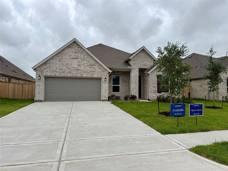 Front exterior of a new home in Samara, League City, TX, highlighting curb appeal (Image 2).