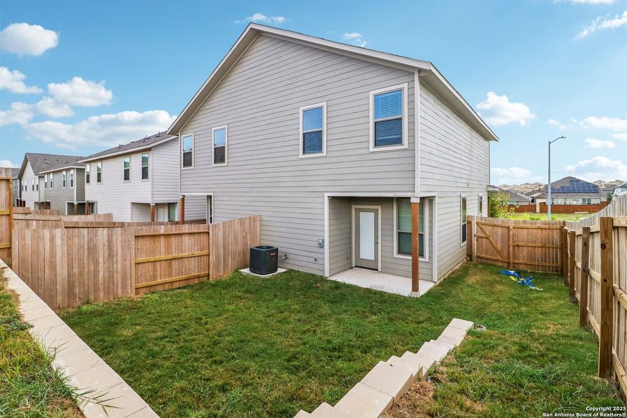 Exterior details and patio area of a home in , San Antonio (Image 32).