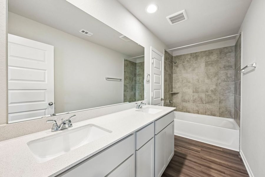 Furnished interior view inside a new home in Sorella, Tomball (Image 9).