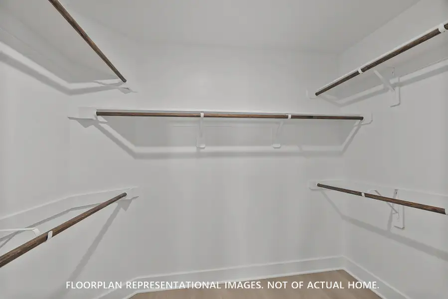 Spacious, unfurnished interior of a new home in Pinewood at Grand Texas, New Caney (Image 13).