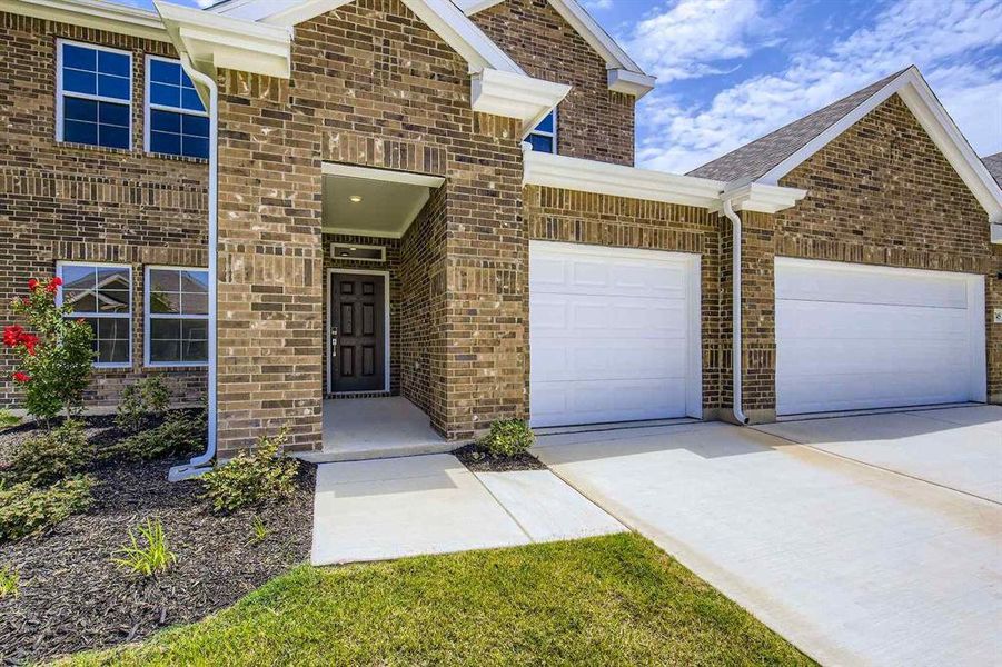Exterior details and patio area of a home in Prestige Collection at Overland Grove, Forney (Image 1). Exterior details and patio area of a home in Prestige Collection at Overland Grove, Forney (Image 1).