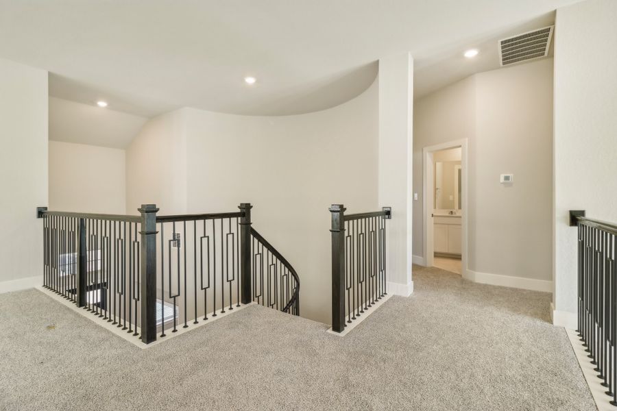 Second floor landing in the Cedar floorplan at a Meritage Homes community.