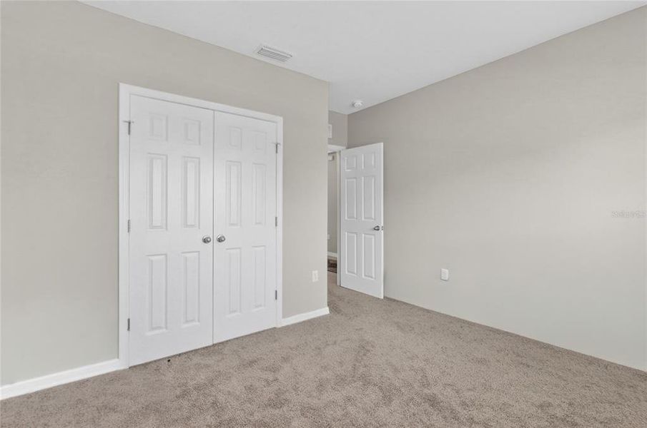 Spacious, unfurnished interior of a new home in Scenic Terrace, Haines City (Image 22).