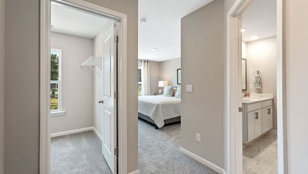 Furnished interior view inside a new home in Tanglewood Townes, Greenville (Image 15).