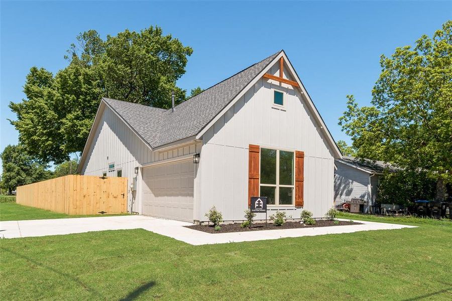 Front exterior of a new home in , Greenville, TX, highlighting curb appeal (Image 17). Front exterior of a new home in , Greenville, TX, highlighting curb appeal (Image 17).