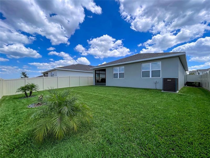 Exterior details and patio area of a home in Seasons at Mabel Place, Lake Wales (Image 34).