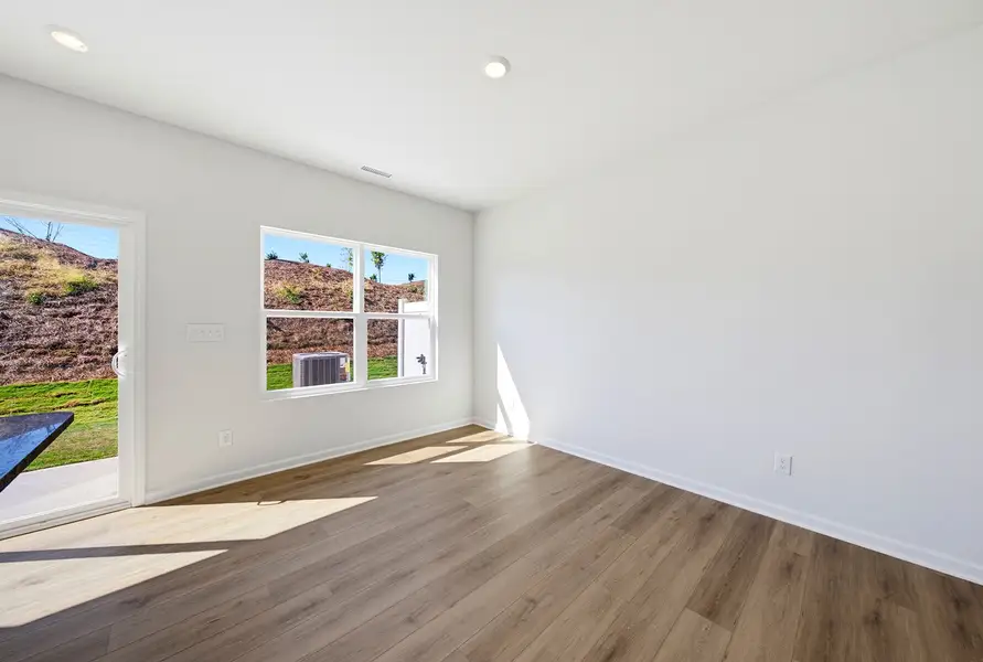 Spacious, unfurnished interior of a new home in Sweetbrier, Durham (Image 15).