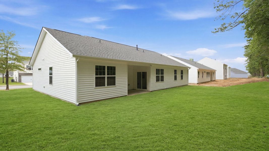 Exterior details and patio area of a home in Tyler - Home on the Lake, New Bern (Image 4).