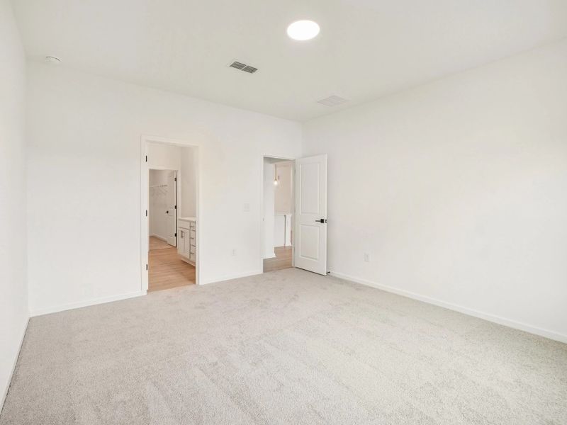 Primary Bed featuring the AW Collection® Serene - A tranquil retreat in soft, neutral textures.