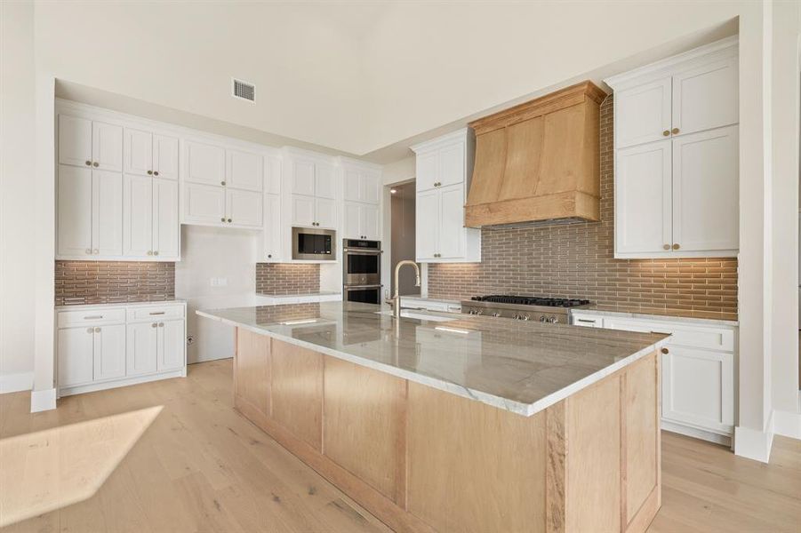 Furnished interior view inside a new home in Dean Farms, Lucas (Image 11).