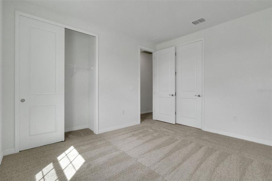Spacious, unfurnished interior of a new home in Turnleaf, Punta Gorda (Image 39). Spacious, unfurnished interior of a new home in Turnleaf, Punta Gorda (Image 39).