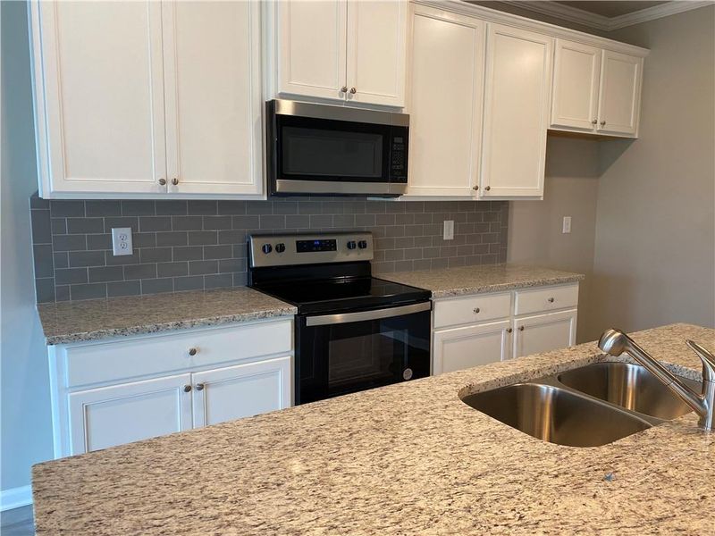 Furnished interior view inside a new home in Silver Fox Reserve, Oakwood (Image 7).