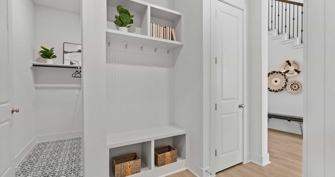 Representative furnished interior of a home built from the Waterloo by Chesmar Homes in Sunfield, Buda (Image 6).