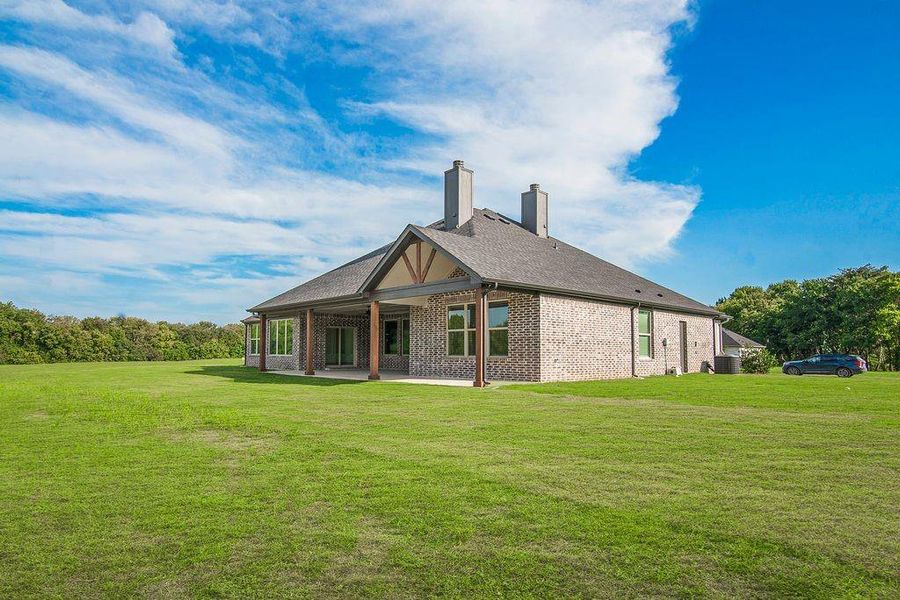 Front exterior of a new home in , Sherman, TX, highlighting curb appeal (Image 19).