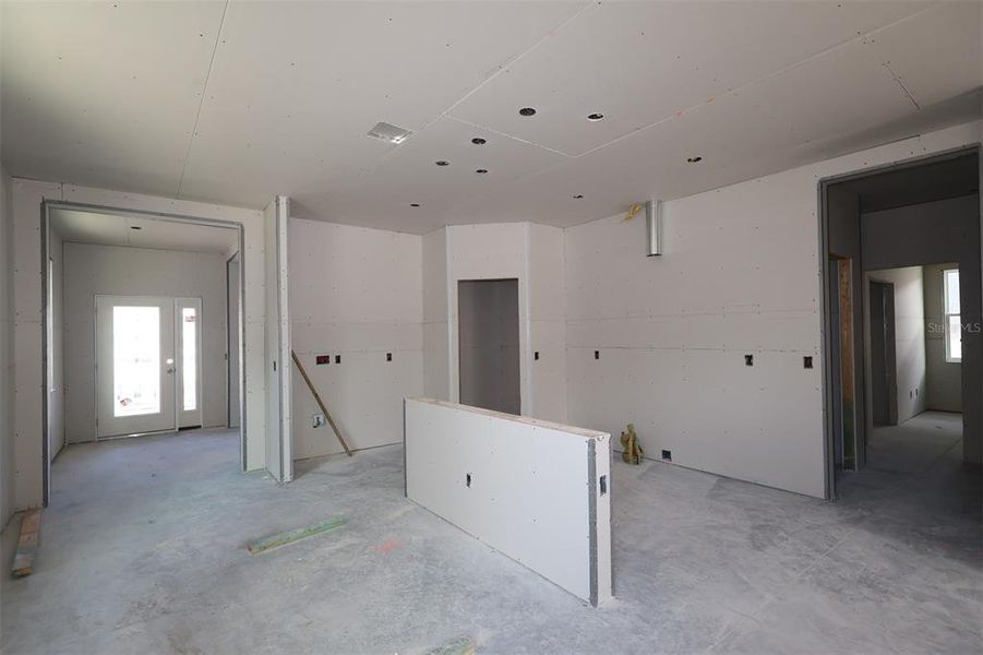 In-progress construction of a new home in Eden at Crossprairie, St. Cloud, FL (Image 18).