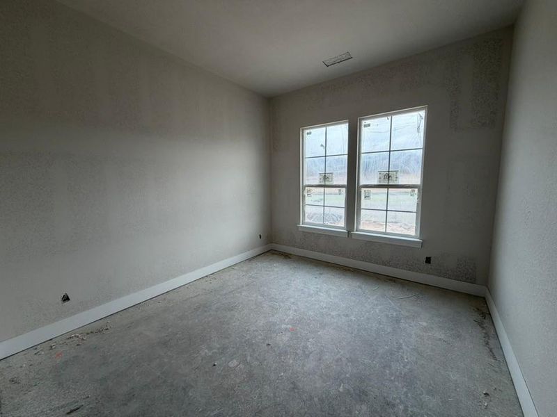 Empty room with baseboards Empty room with baseboards